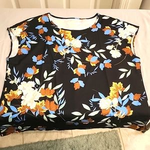 Sleeveless black floral blouse